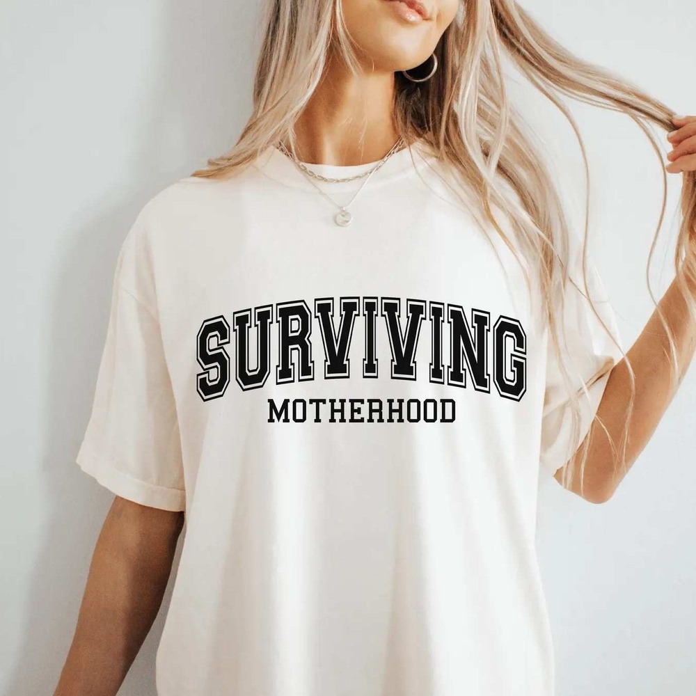 Surviving Motherhood NEW white short sleeve shirt